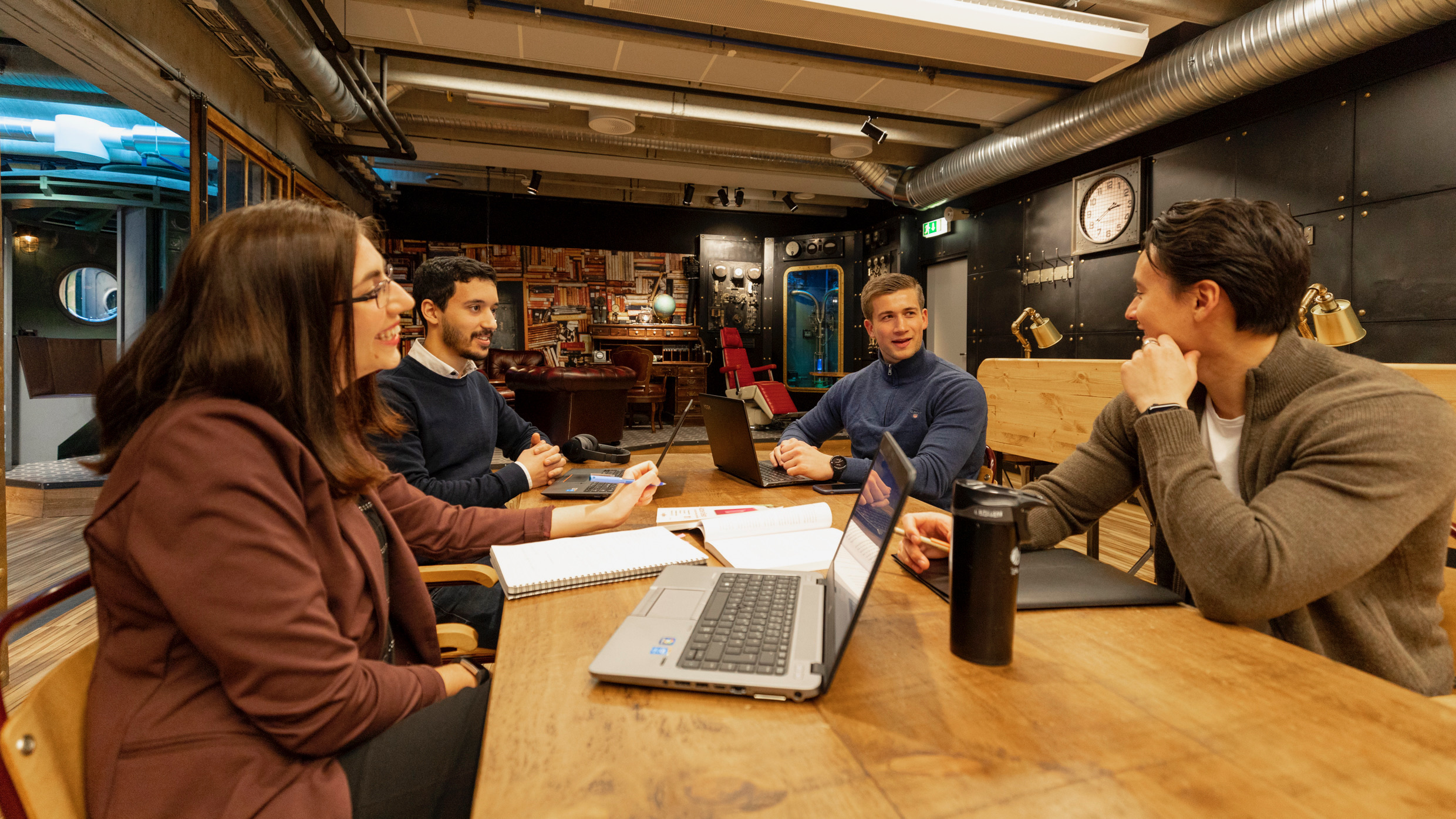 Young students using the meeting room in the library of Stavanger to study and debate.